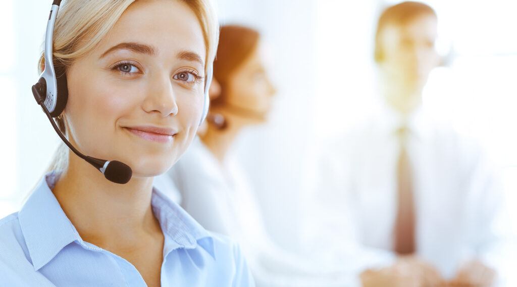 Group,Of,Diverse,Phone,Operators,At,Work,In,Sunny,Office.